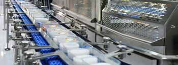 food packages moving through a conveyor belt